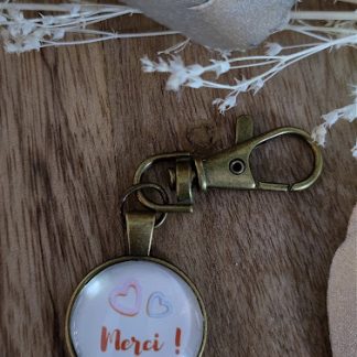 Porte clé merci